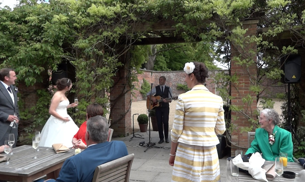 image of the bride and groom entering the drinks reception